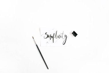 Minimalistic stylish composition with word Simplicity  clipart