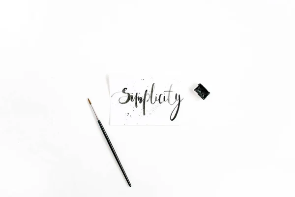 Minimalistic stylish composition with word Simplicity — Stock Photo, Image