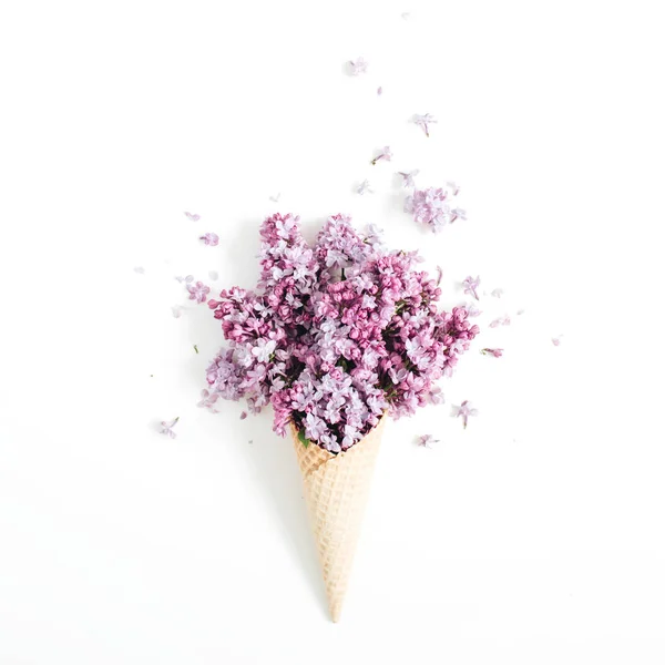 Waffle cone with flowers bouquet — Stock Photo, Image
