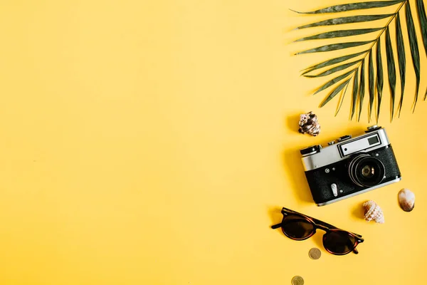 Traveler accessories on yellow background — Stock Photo, Image