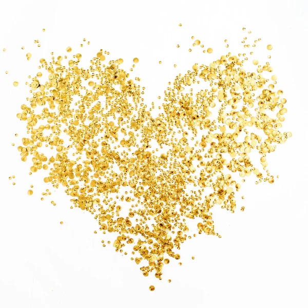 Corazón hecho de confeti dorado — Foto de Stock