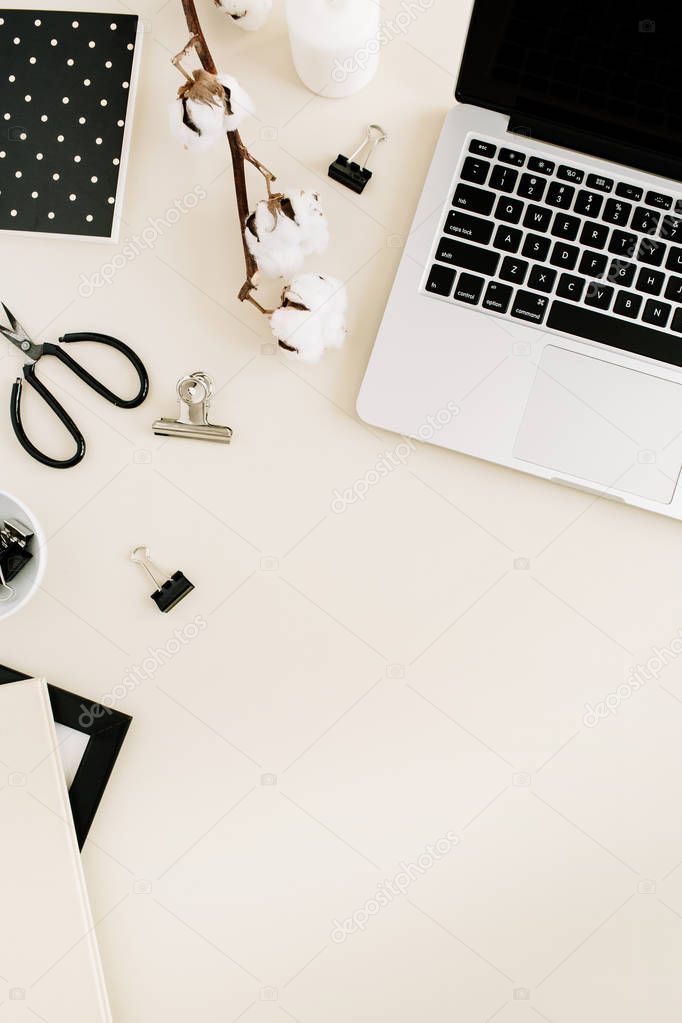 Workspace with laptop and female accessories