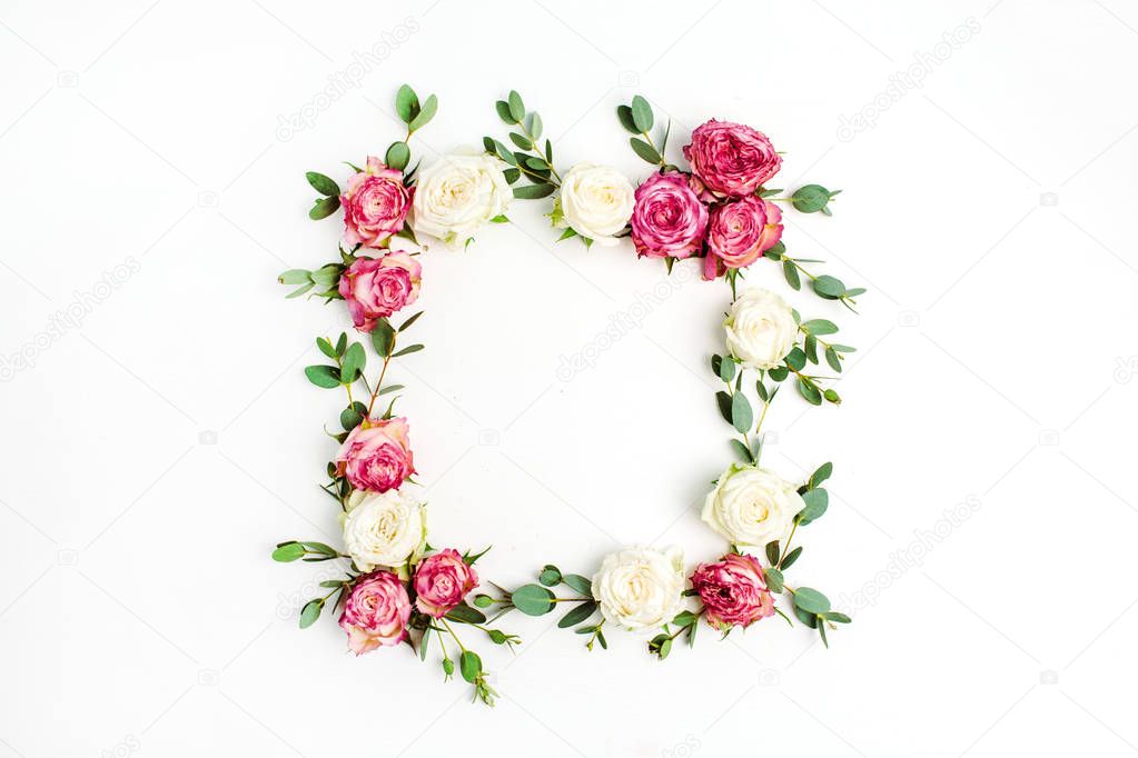 Floral frame wreath made of red and white rose flowers and eucalyptus branches. Flat lay, top view mockup with copy space.