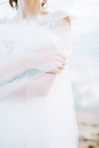 Young bride in wedding dress. Bridal fashion background.