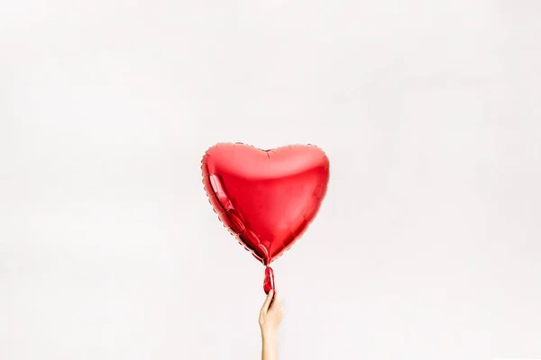 Women Hand Holding Red Heart Shape Balloon Love Concept — Stock Photo, Image