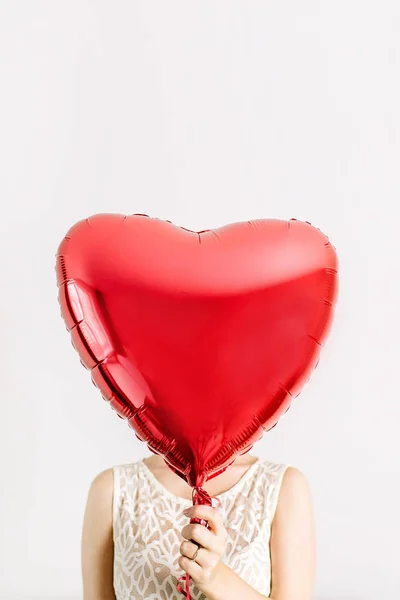 Young Woman Holding Red Heart Shape Balloon — Stock Photo, Image