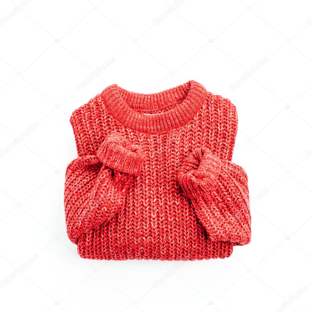 Woman fashion flat lay, top view concept. Red sweater cloth.