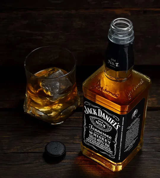 Pepsi can and glass Jack Daniel's Tennessee Whiskey with ice. View from