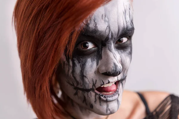 Sexy girl in corpse-paint ready for party