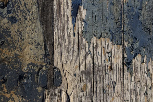 Old wooden shabby dark blue background or texture, old blue pain — 스톡 사진