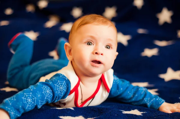 Little Boy Lies Blue Background Stars — Stock Photo, Image