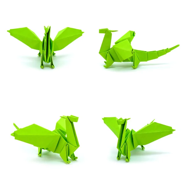 Foto de dragones verdes en origami aislados sobre fondo blanco — Foto de Stock