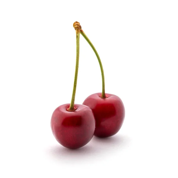 Фото красной вишни с хвостами на белом фоне — стоковое фото