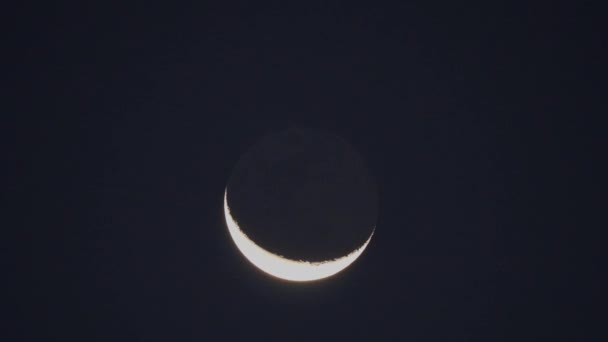 4K Earthshine of a crescent moon — Stock video