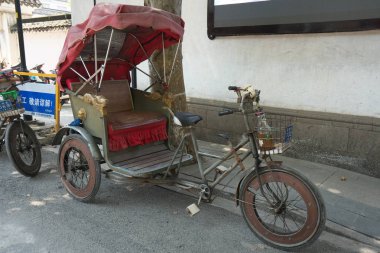 Suzhou, Çin-17 Eylül 2019: Çin geleneksel Çin turu rickshaw Çin Suzhou 'da