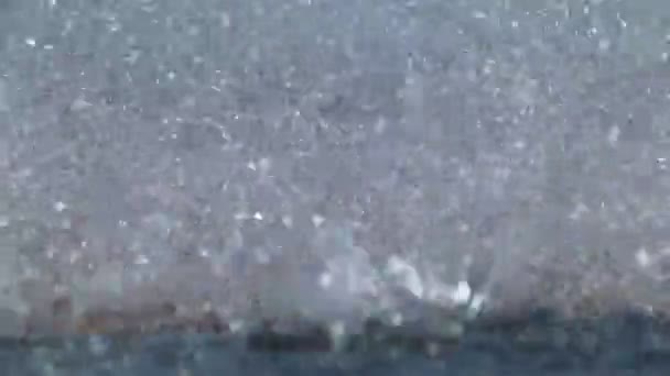 Gouttes d'eau sur asphalte — Video