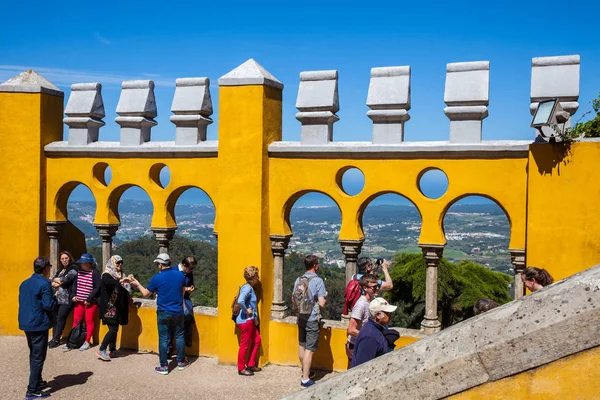 Tourists visiting the Pena Palace located at the municipality of Sintra in Portugal — Stock Photo, Image