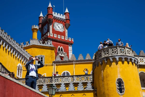 Tourists visiting the Pena Palace located at the municipality of Sintra in Portugal — Stock Photo, Image