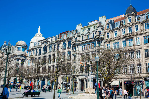 Beautiful streets and antique buildings around the Liberdade Square at Porto city center