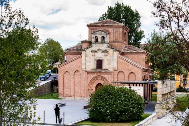 Skaters at the Skate Park next to the historical Santiago del Arrabal church in Salamanca