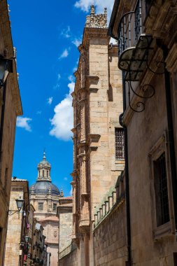 Beautiful architecture of the buildings in the old city of Salamanca including the Dome of La Clerencia seen from the Libreros Street