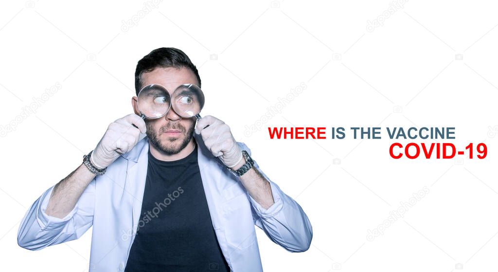 doctor in a white coat with a magnifying glass. Concept-search for medicines, vaccines, and vaccinations against covid-19