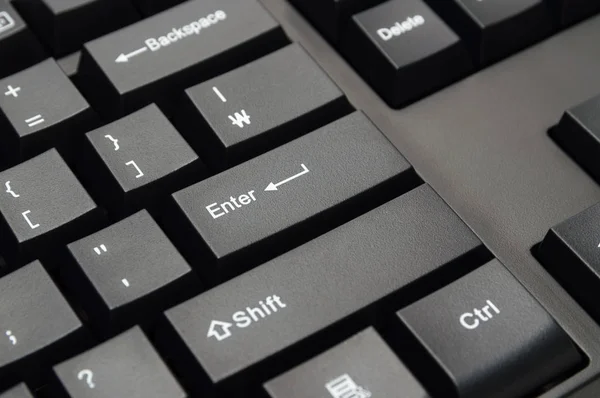 Клавиатура компьютера изолирована: Введите ключ — стоковое фото