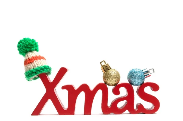 X-Mas metin ve kürk şapka, beyaz arka plan üzerinde topu