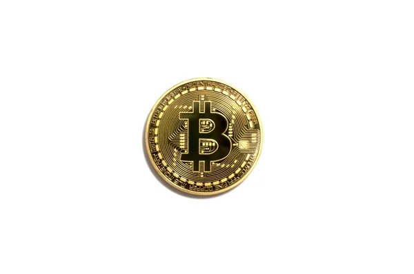Golden bitcoin на белом фоне — стоковое фото
