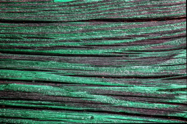 Yeşil ahşap masadaki yatay ahşap çizgiler
