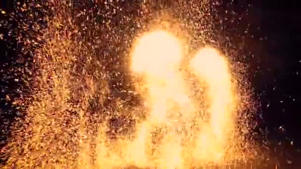 Slow motion. Spinning firework wheel, sparkles all around. Fire show. Fireworks. — Stock Video