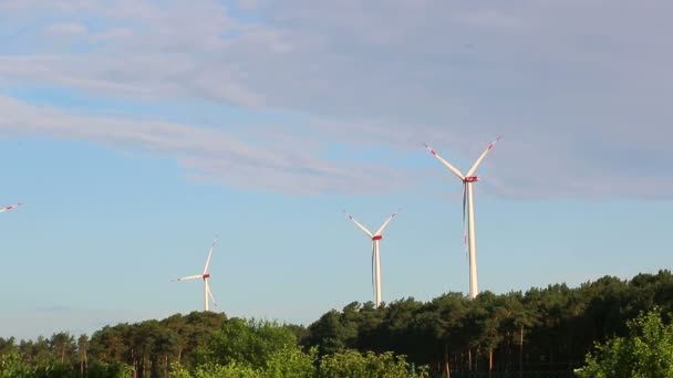 Windmill propellers spinning. Green energy generation. — Stock Video
