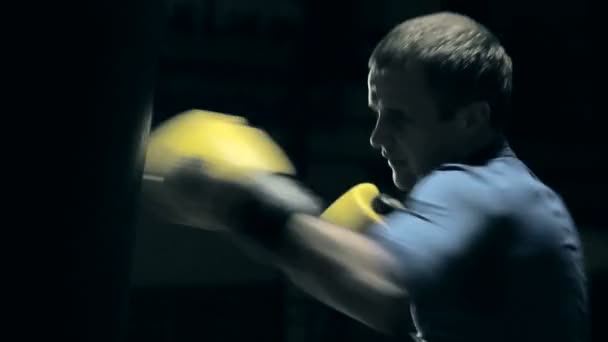 Boxer punching bag. Slow motion. — Stock Video