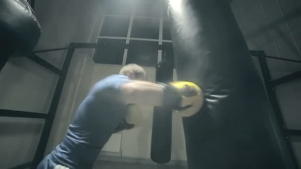 Boxer punching bag. Slow motion. — Stock Video