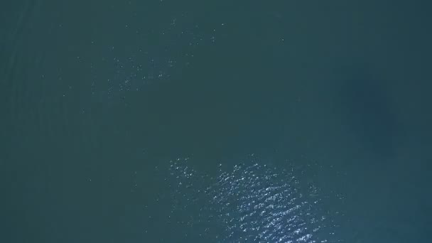 Background top view. Aerial view of water surface by drone. — Stock Video