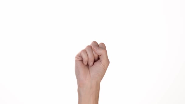 A mans hand on a white background of isolate shows a finger that denies. Place to insert text or background. Emotions of a persons hand on a white background. — Stock Video