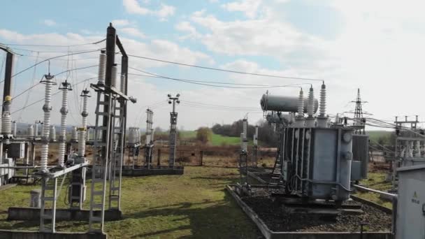 High voltage electrical substation. High voltage power plant for a small town. Electric power station. Power lines. — Stock Video