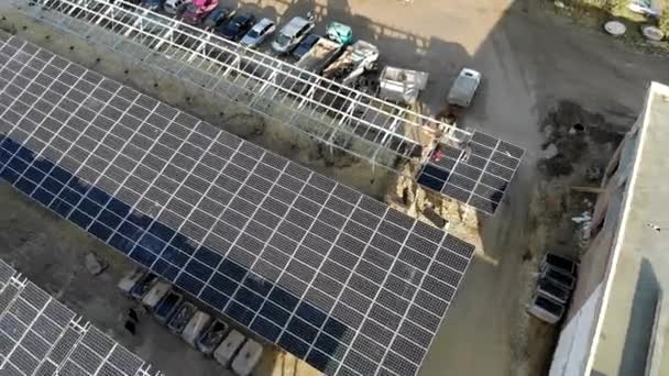 Aerial view Panorama of solar panels. Slow movement of the camera over the panels. Background — Stock Video