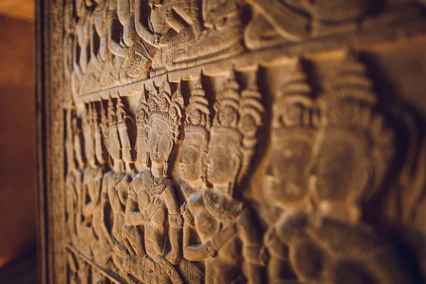 Walls decorated with wall carvings at Angkor Wat Temple. Siem Reap, Cambodia.