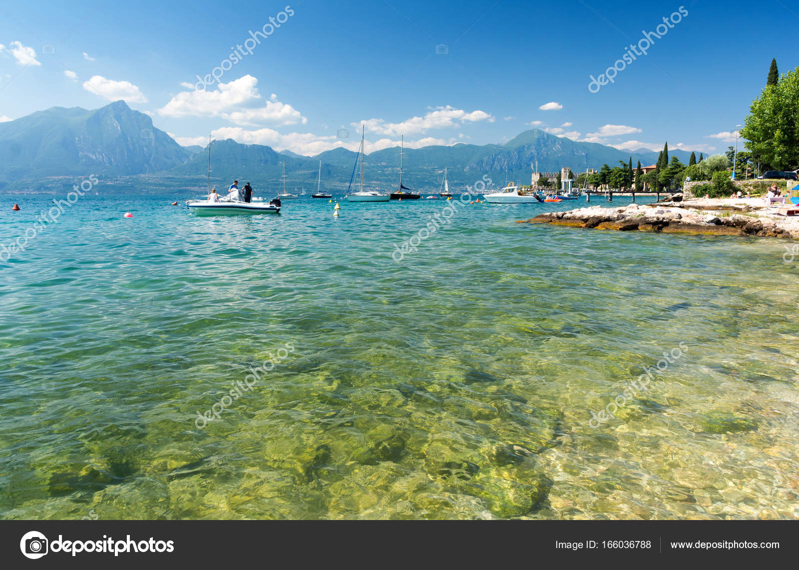 View On Crystal Clear Water In Lake Garda Italy Stock Photo
