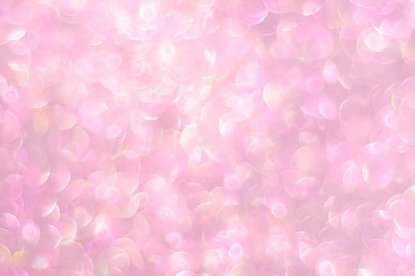 Natürliches Bokeh aus rosa glitzernden defokussierten Lichtern — Stockfoto