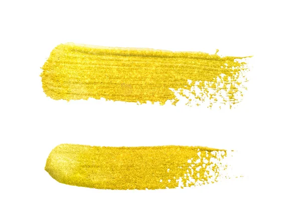 Coups de pinceau en or jaune — Photo
