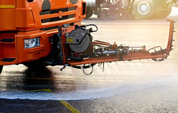 stock image Cleaning machines washes the city street