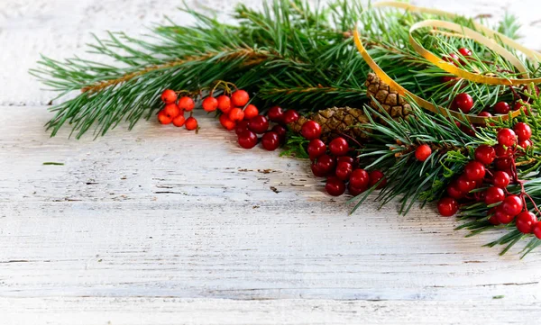 Christmas decoration on white old wooden board — Stock Photo, Image
