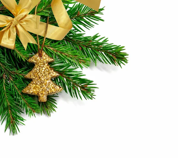 Christmas fir branch with glitter Christmas tree on a white. — Stock Photo, Image