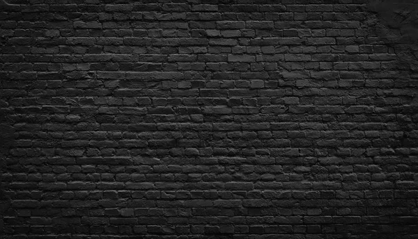 Vecchio sfondo muro di mattoni neri. — Foto Stock