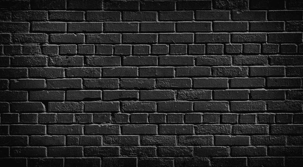 오래 된 검은 벽돌 벽 배경. — 스톡 사진