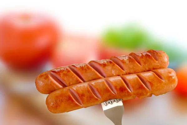 Saucisse grillée sur une fourchette — Photo