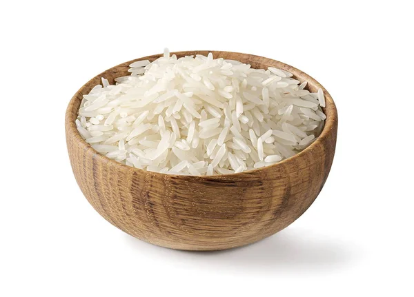 Basmati de arroz largo blanco seco en cuenco de madera aislado sobre un fondo blanco . —  Fotos de Stock