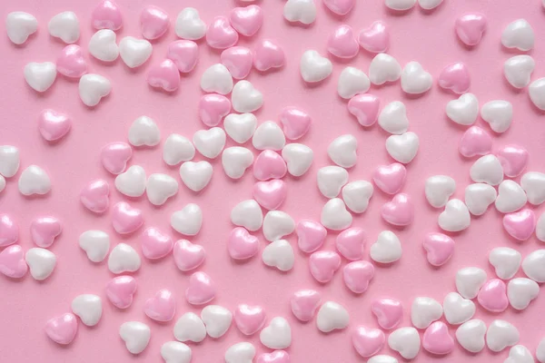 Romantische rosa und weiße Herzen Hintergrund von Bonbonherzen — Stockfoto